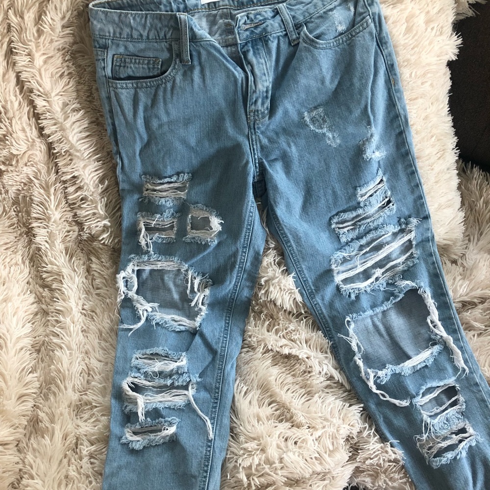 Destroyed cropped mom jeans